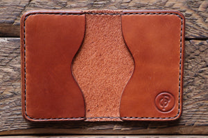 Brown handmade and hand stitched leather bifold wallet